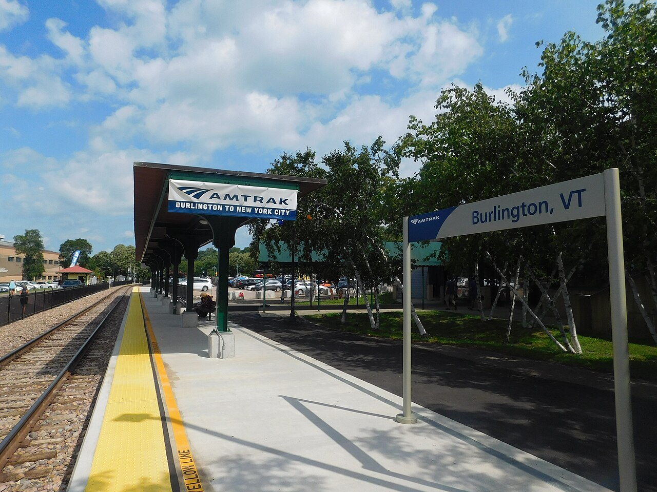 The Burlington platform at Union Station, a yellow safety strip and a station sign.