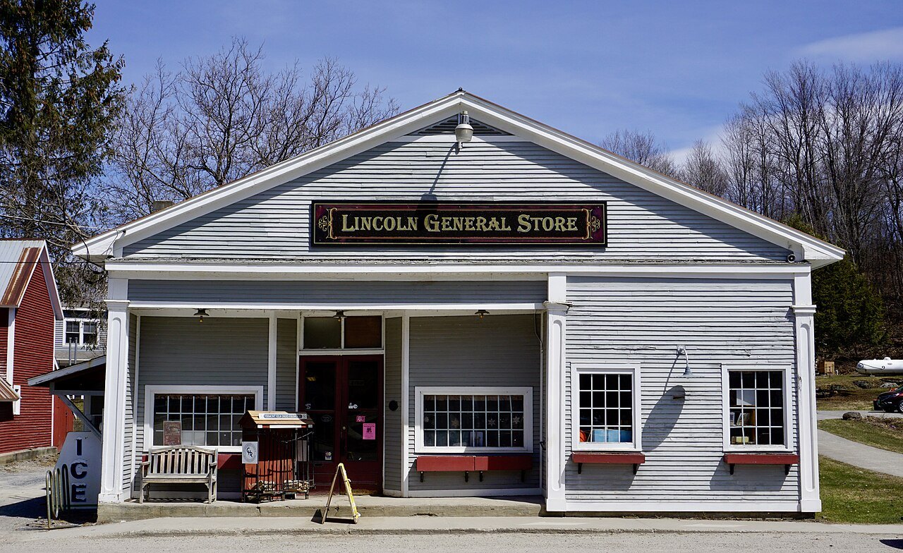 The Lincoln General Store, a gray clapboard store with a porch and a painted sign.