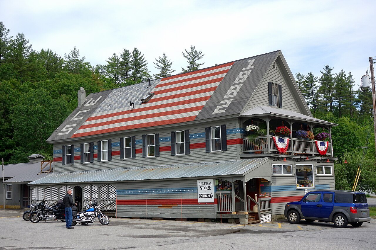 A general store in Wardsboro, a gray building with an American flag painted on its roof.