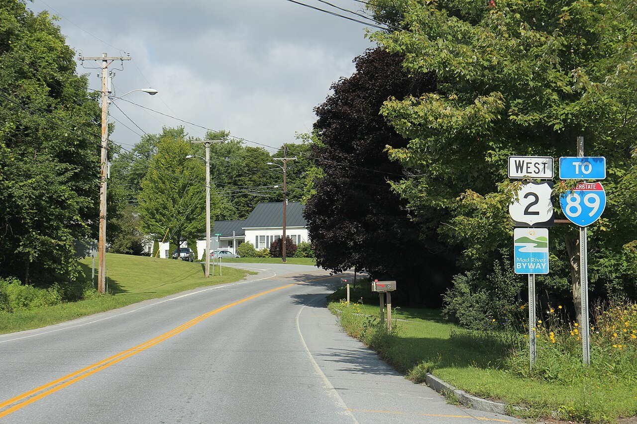 U.S. Route 2 beside the Mad River scenic byway, with shield signs for Route 2 and Interstate 89.