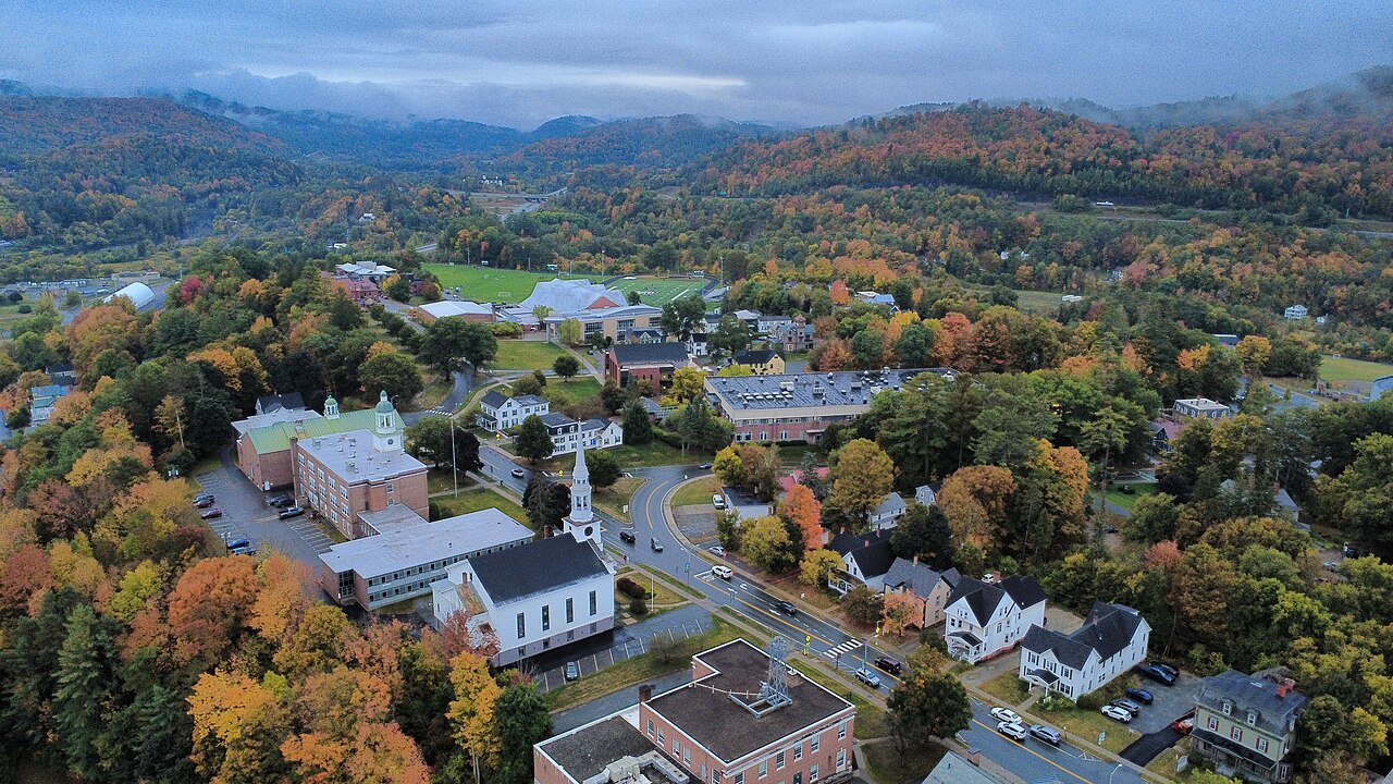 St. Johnsbury Academy and the town in autumn, seen from above.