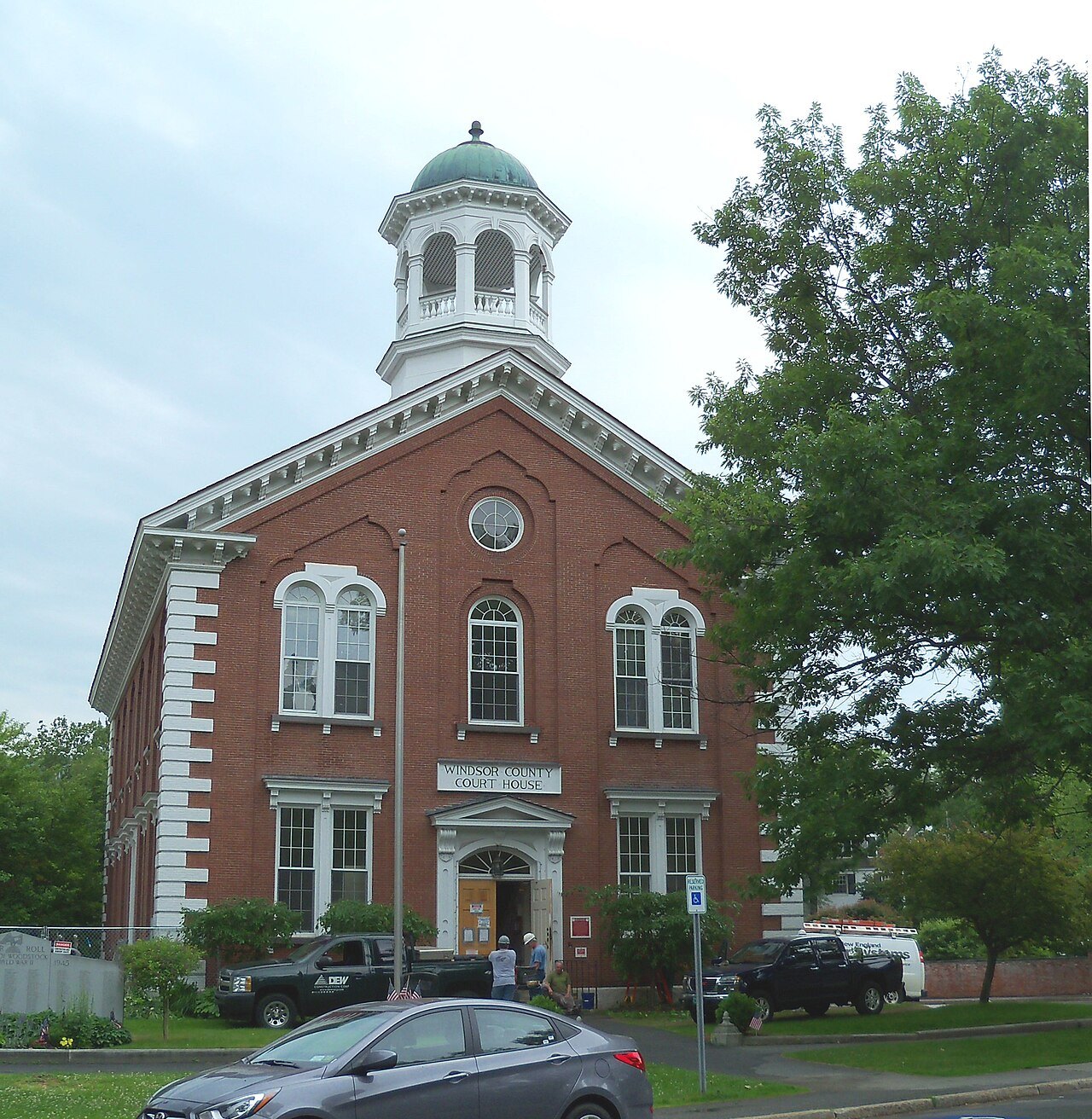 The Windsor County Courthouse, a red-brick building with a cupola and white trim.