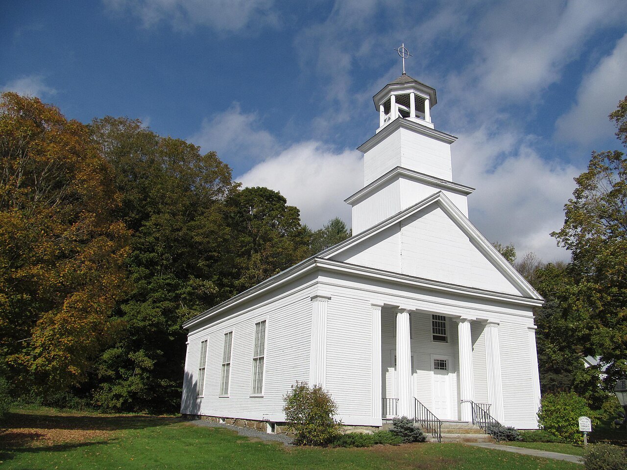 The church in South Woodstock, a white clapboard building with a cupola.